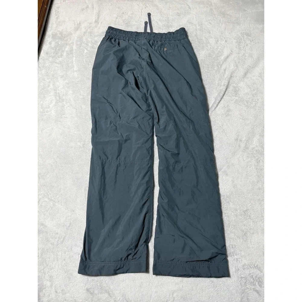 VTG Nike Womens Medium Track Pants Windbreaker Green Polyester 29x30